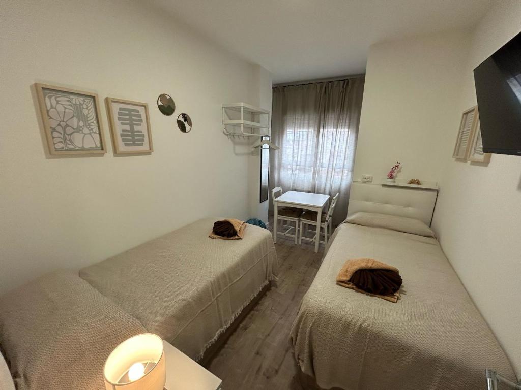 Habitaciones en Embajadores